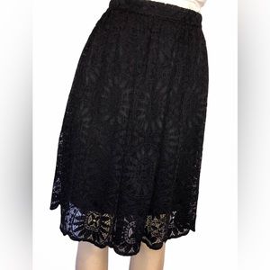 Knee length black lace skirt, lined